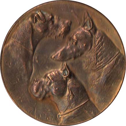 Datei:Rassehunde-Ausstellung Breslau - Motiv Hundeköpfe 1921-bronze-vergoldet-r1.jpg