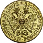 1933-Schuhmacher-vergoldet-r.jpg